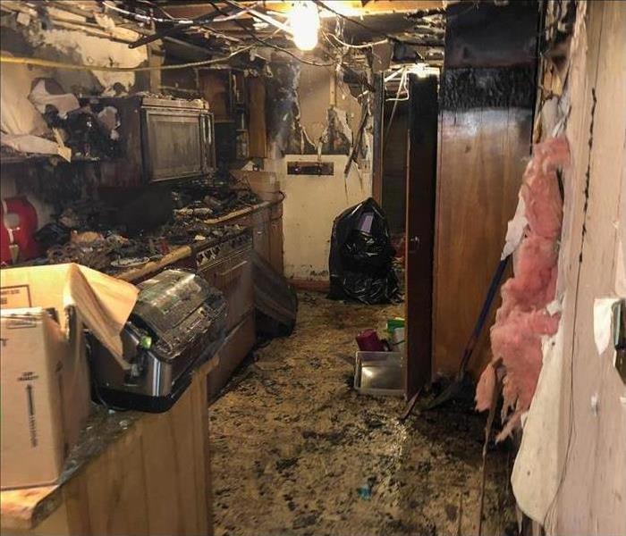 Kitchen severely damaged by fire