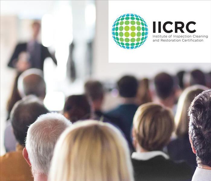 People in a meeting LOGO of IICRC